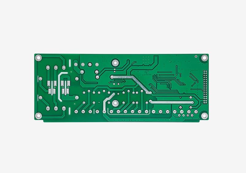 Thin green circuit board with fine traces and a dense component area.